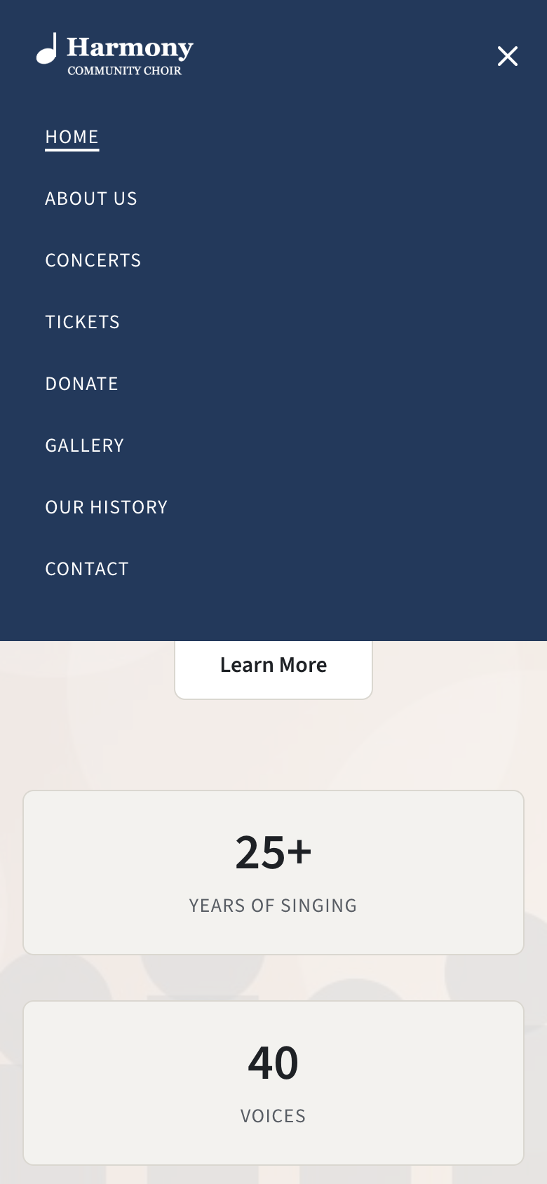 The site on a phone with the menu open, its items listed one under another